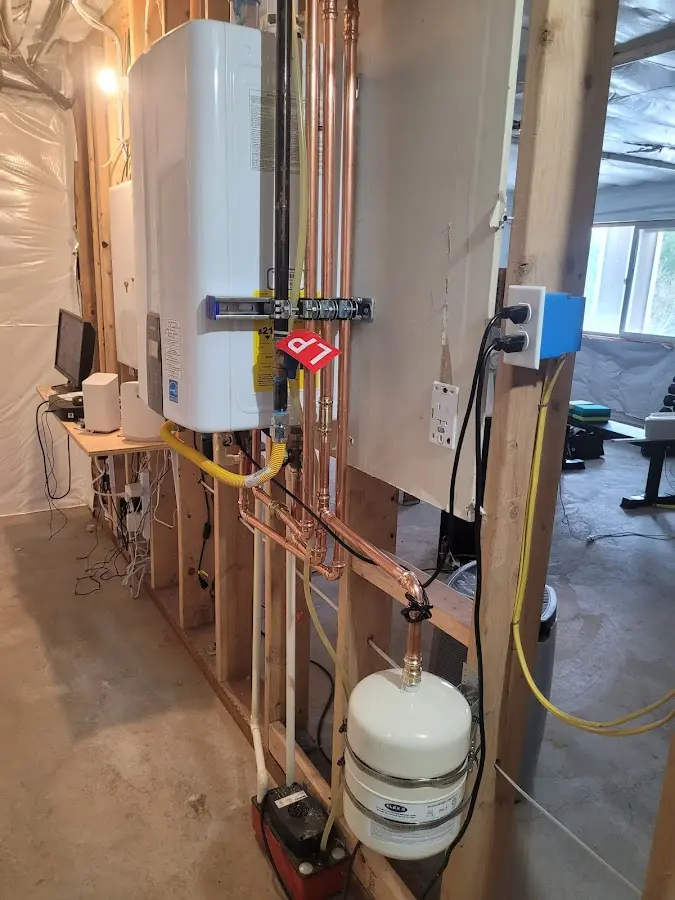 Licensed plumber repairing a kitchen sink in Ballinger